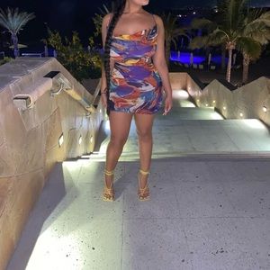 Worn once stretchy multicolor dress open back